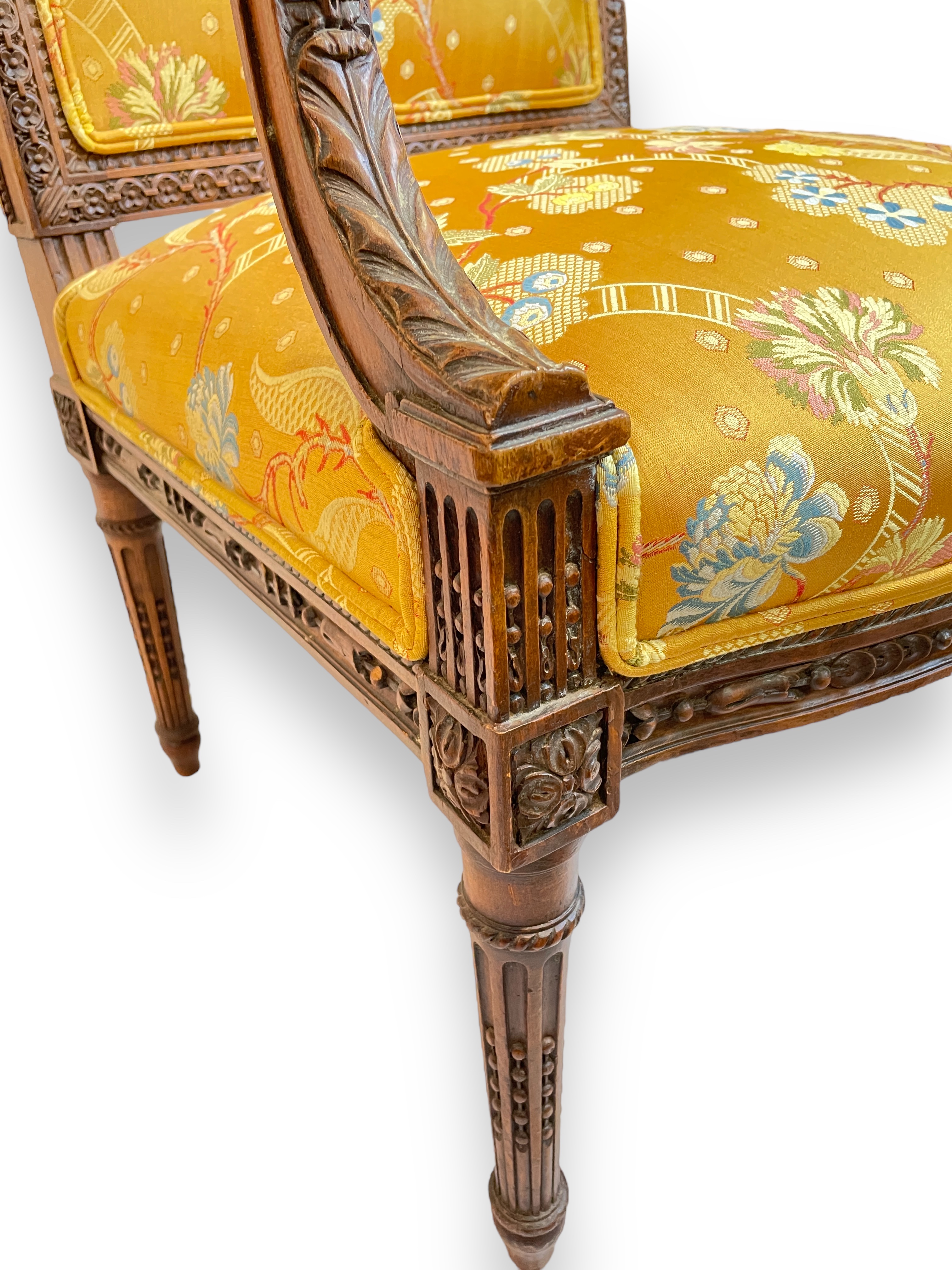 Louis XVI walnut fauteuil