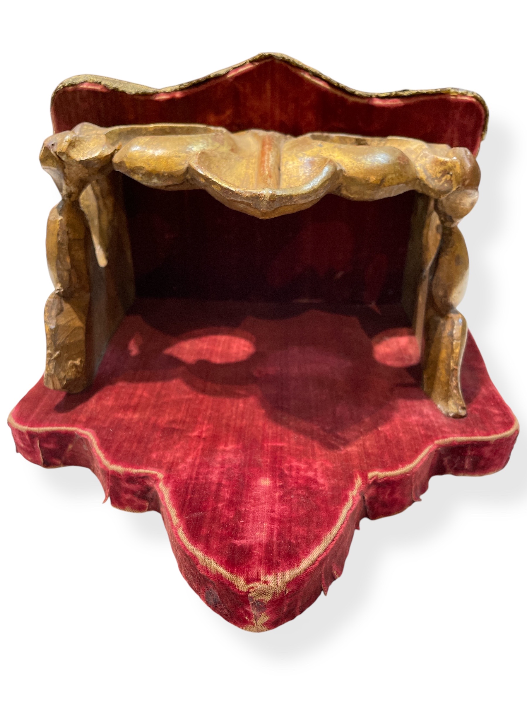 Pair of gilt and old velvet brackets