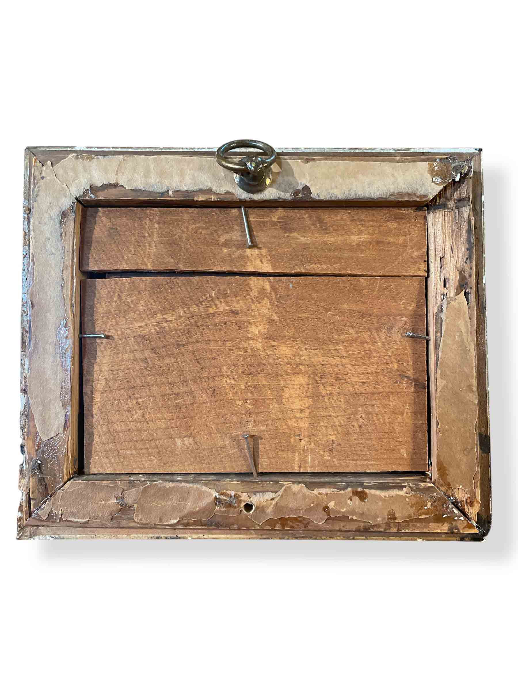 Miniature oil painting in carved frame