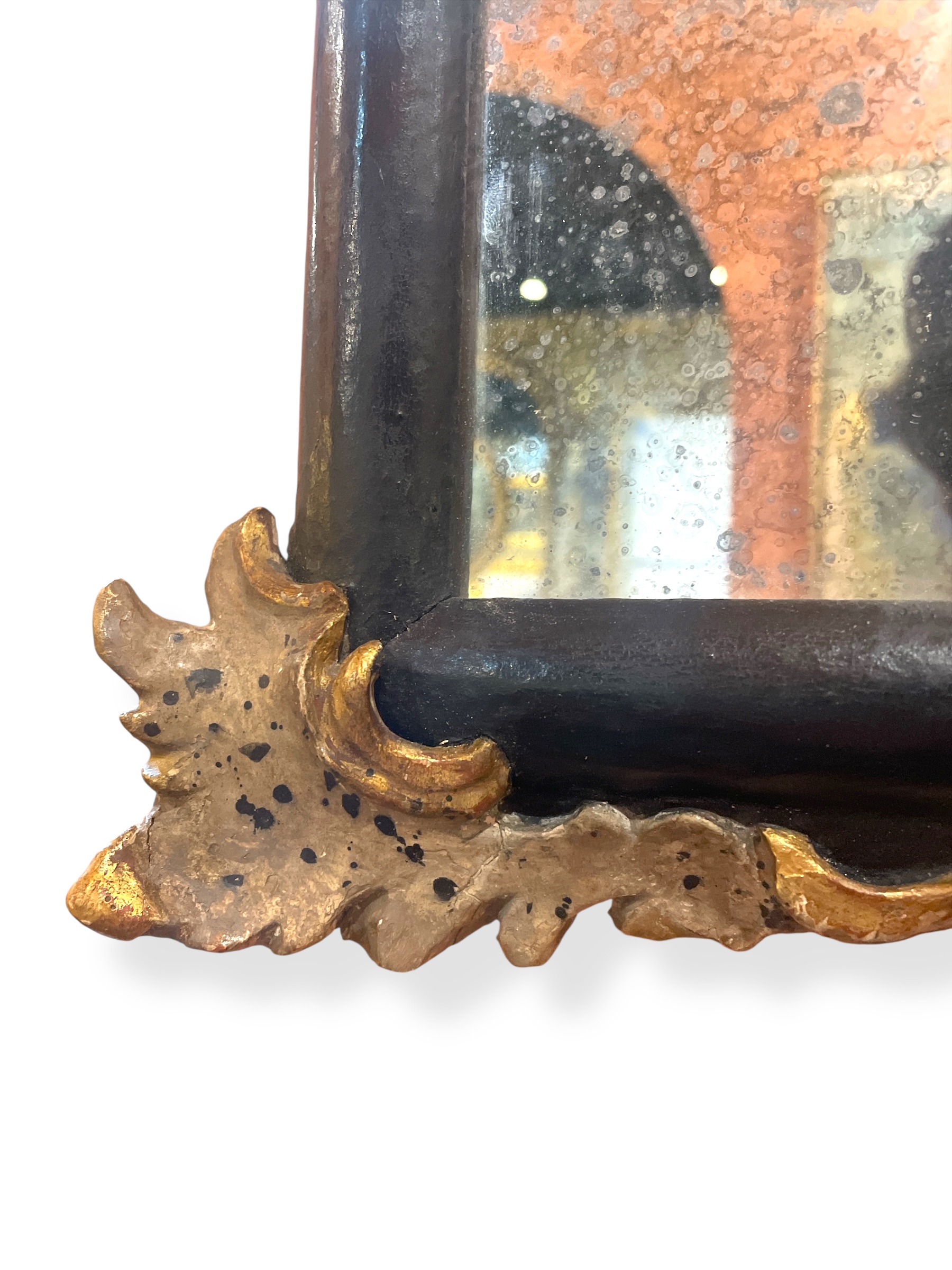 Pair of small black painted mirrors 