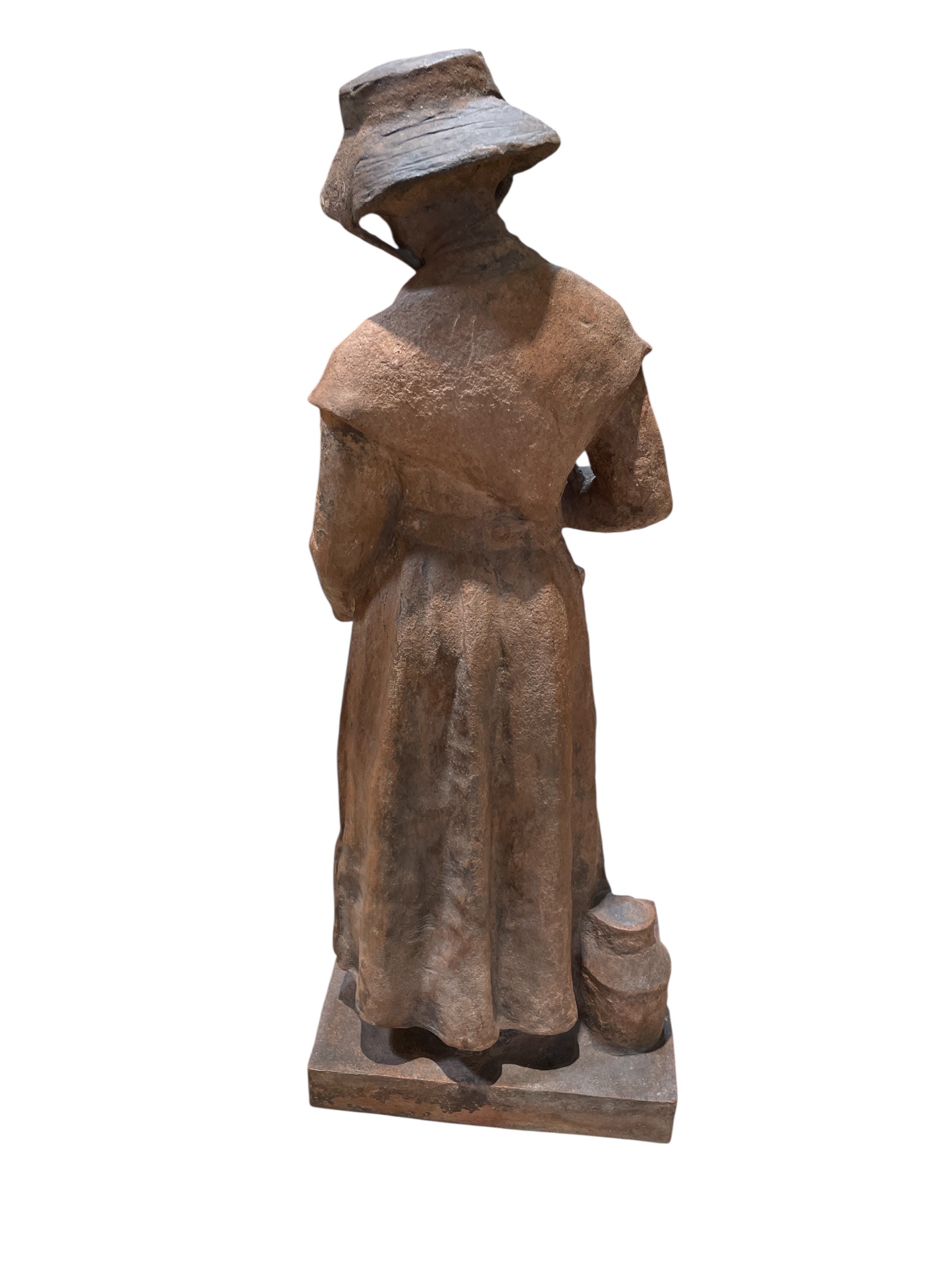 Terracotta statute of woman pouring drink