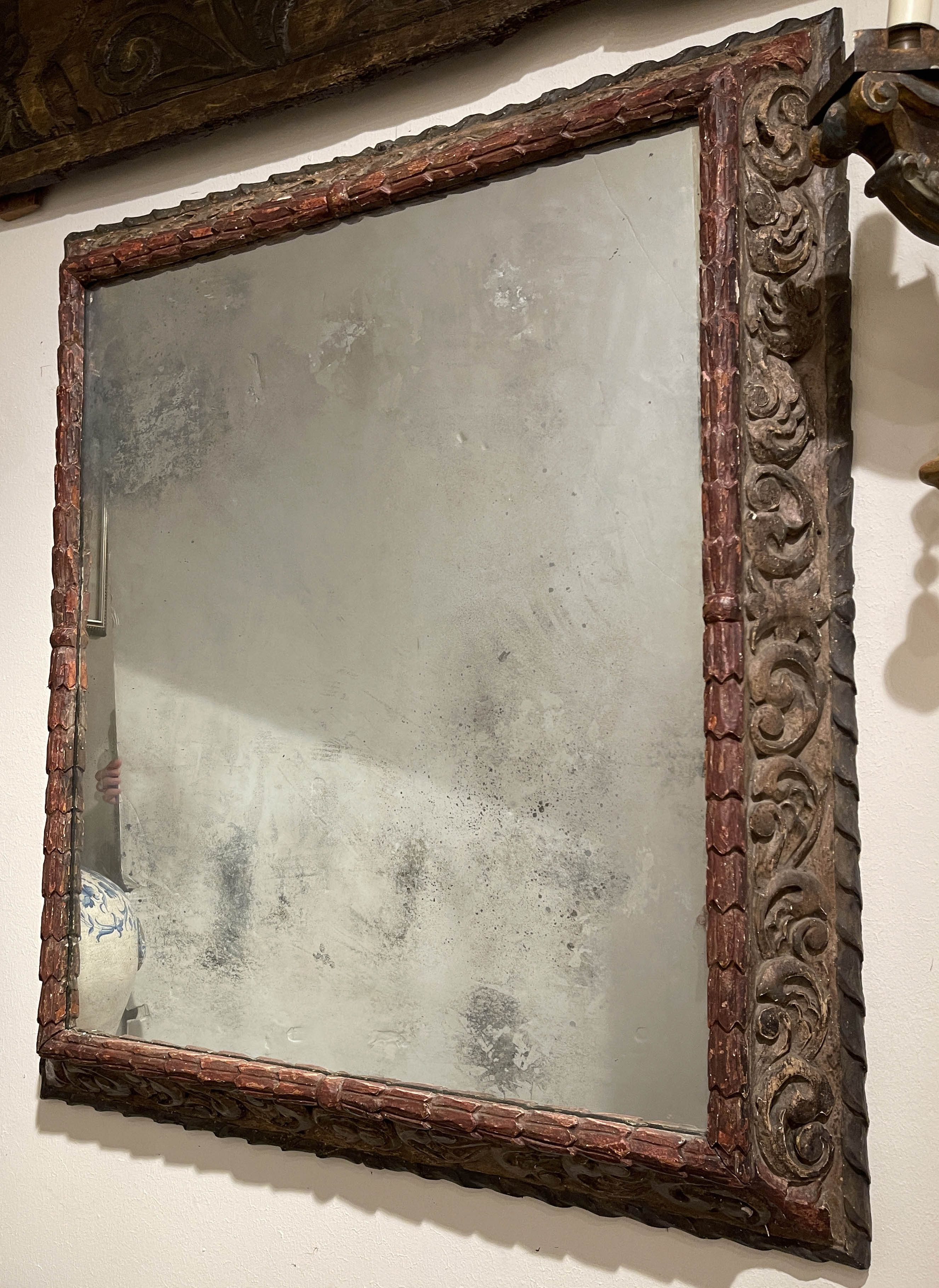 Hand carved 18th C picture frame with foliate decoration with paint remnant