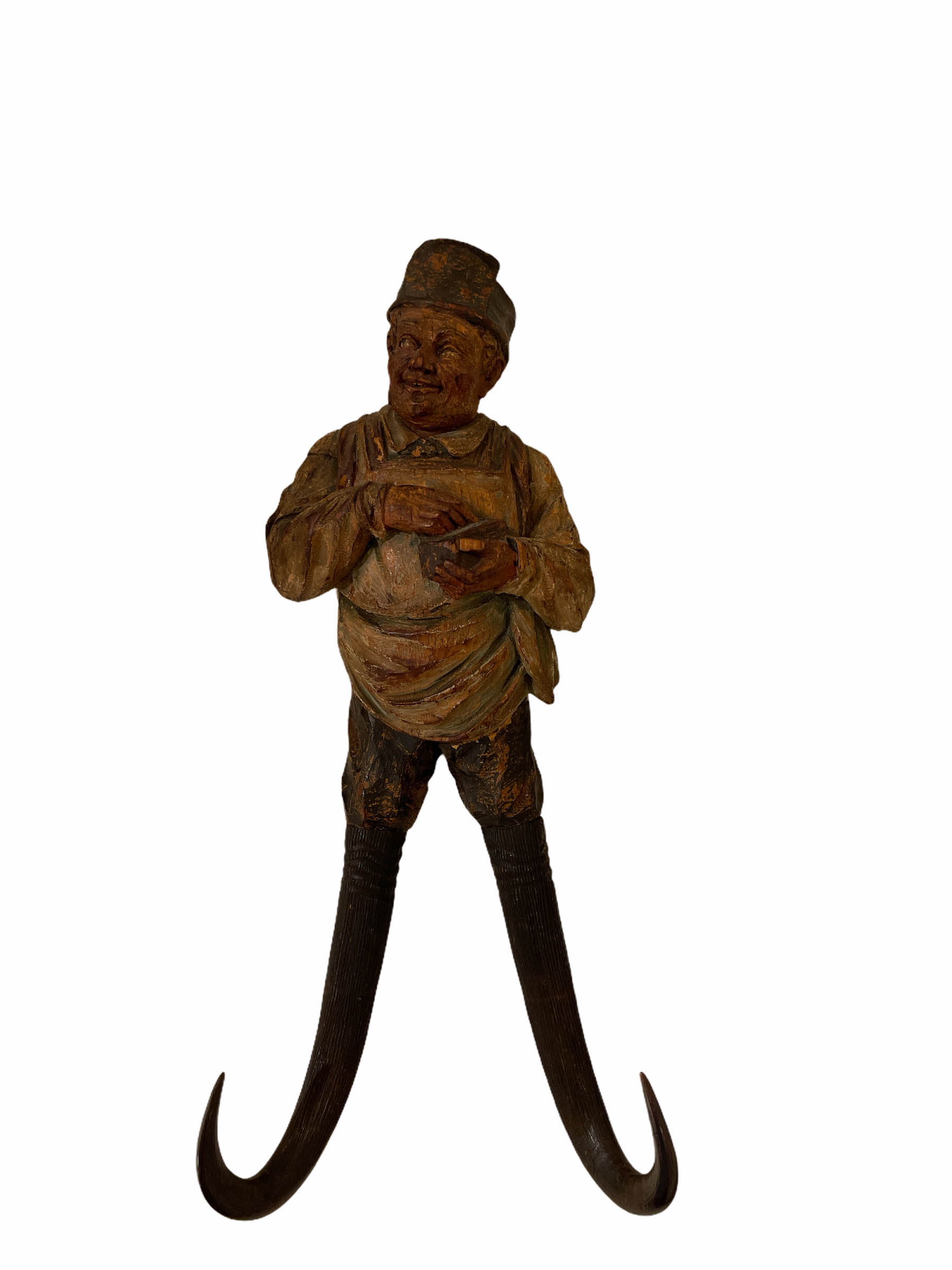 Black Forest carved whip hook figure of man