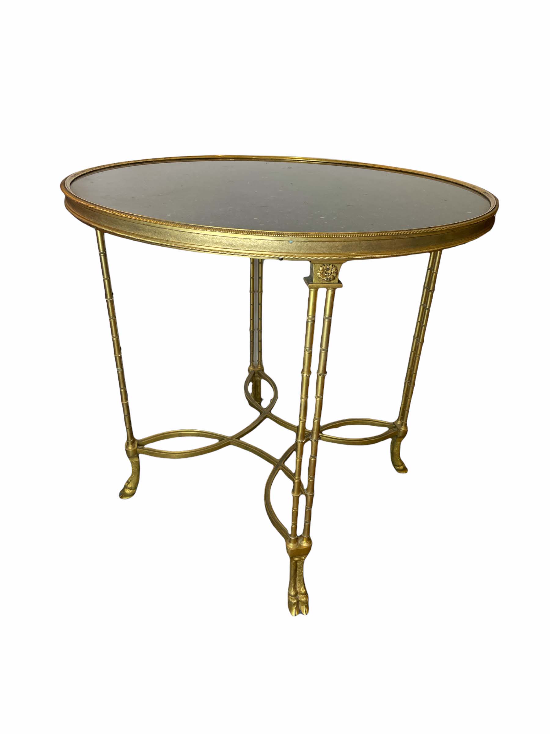 Gilt bronze black marble top guerdon