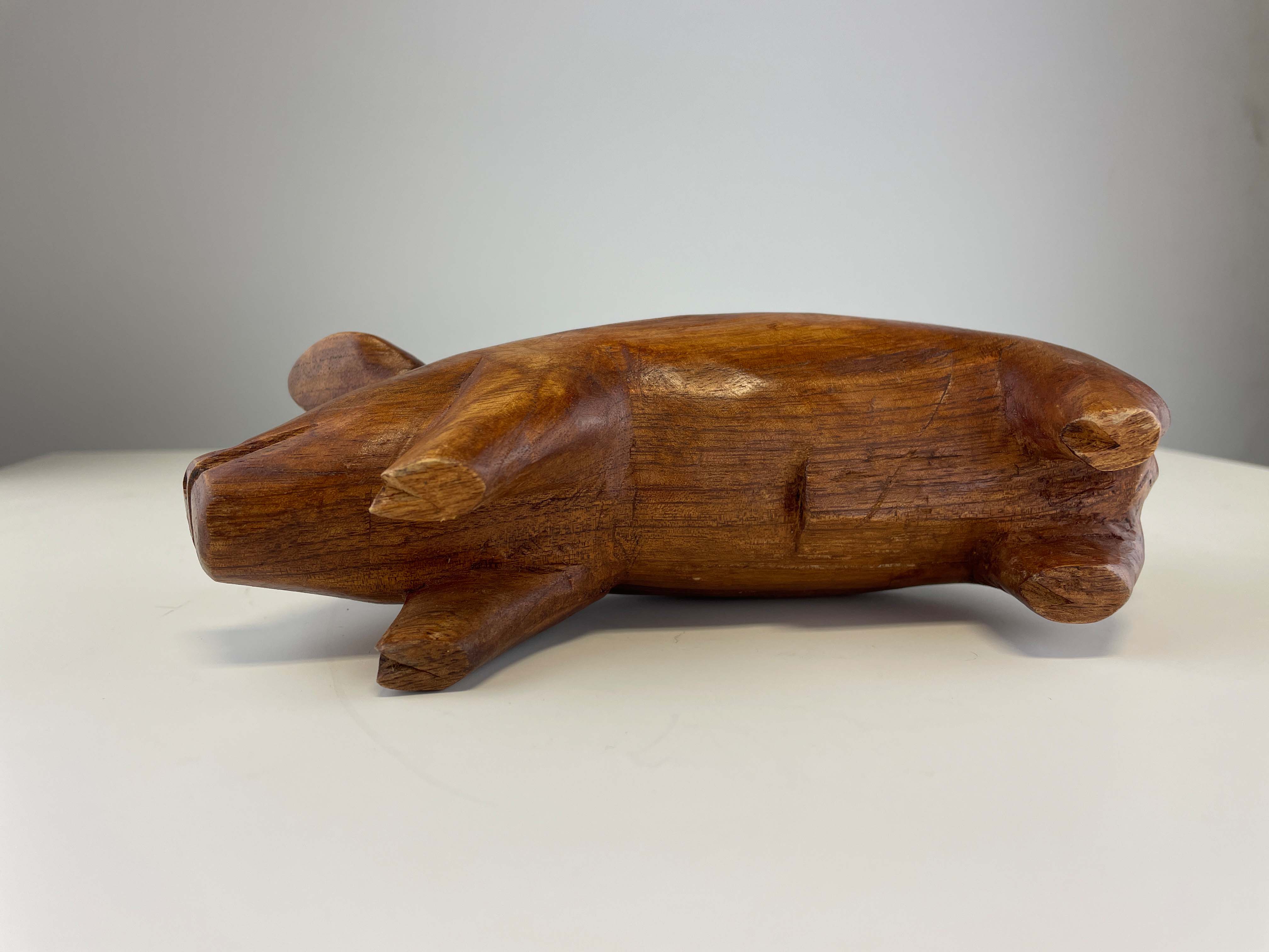 Carved wooden folk art pig