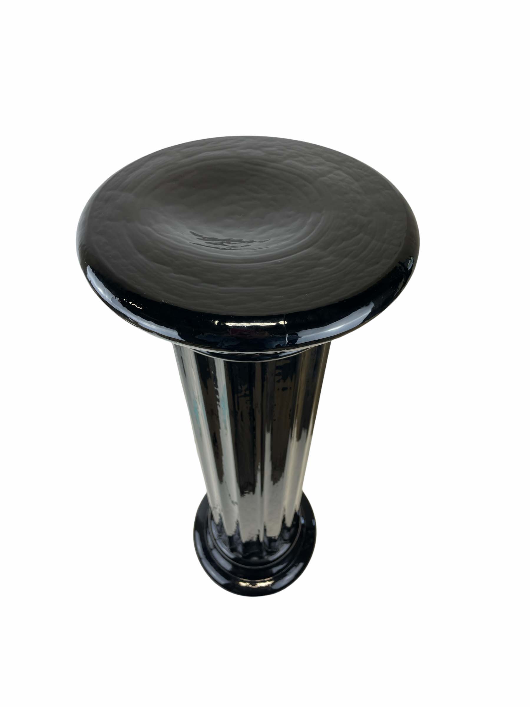 Black glass pedestal