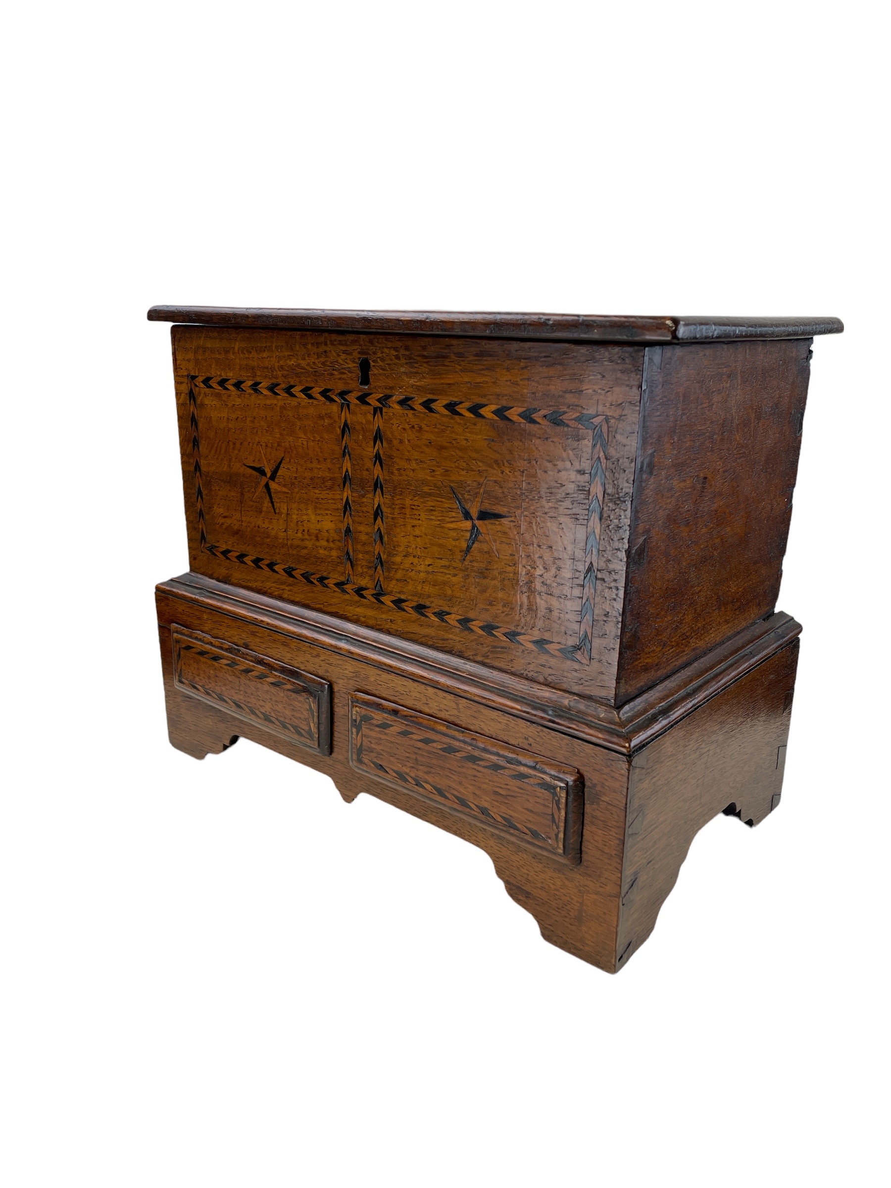 A miniature George III parquetry inlaid chest