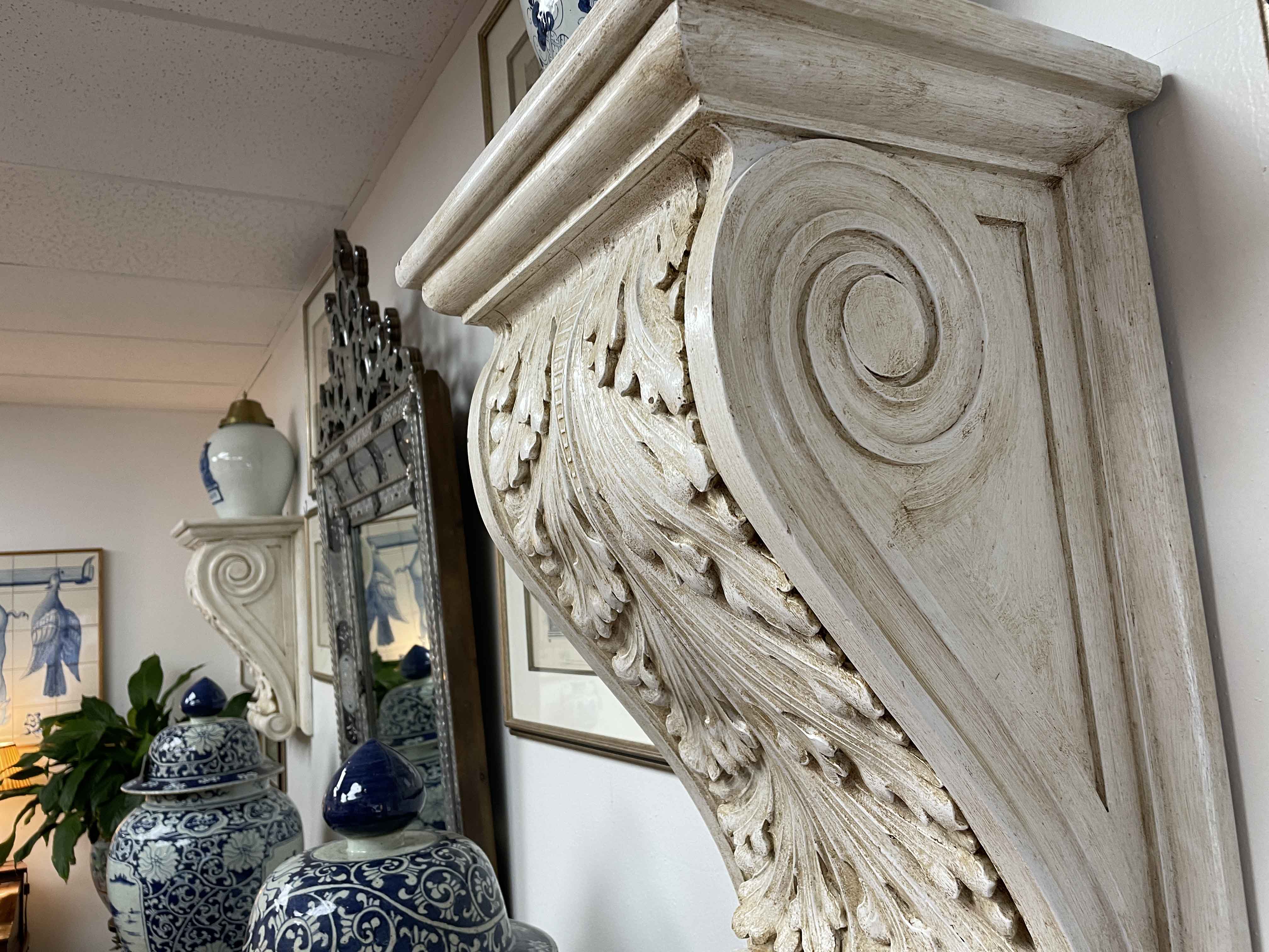 Pair of carved wooden painted corbels