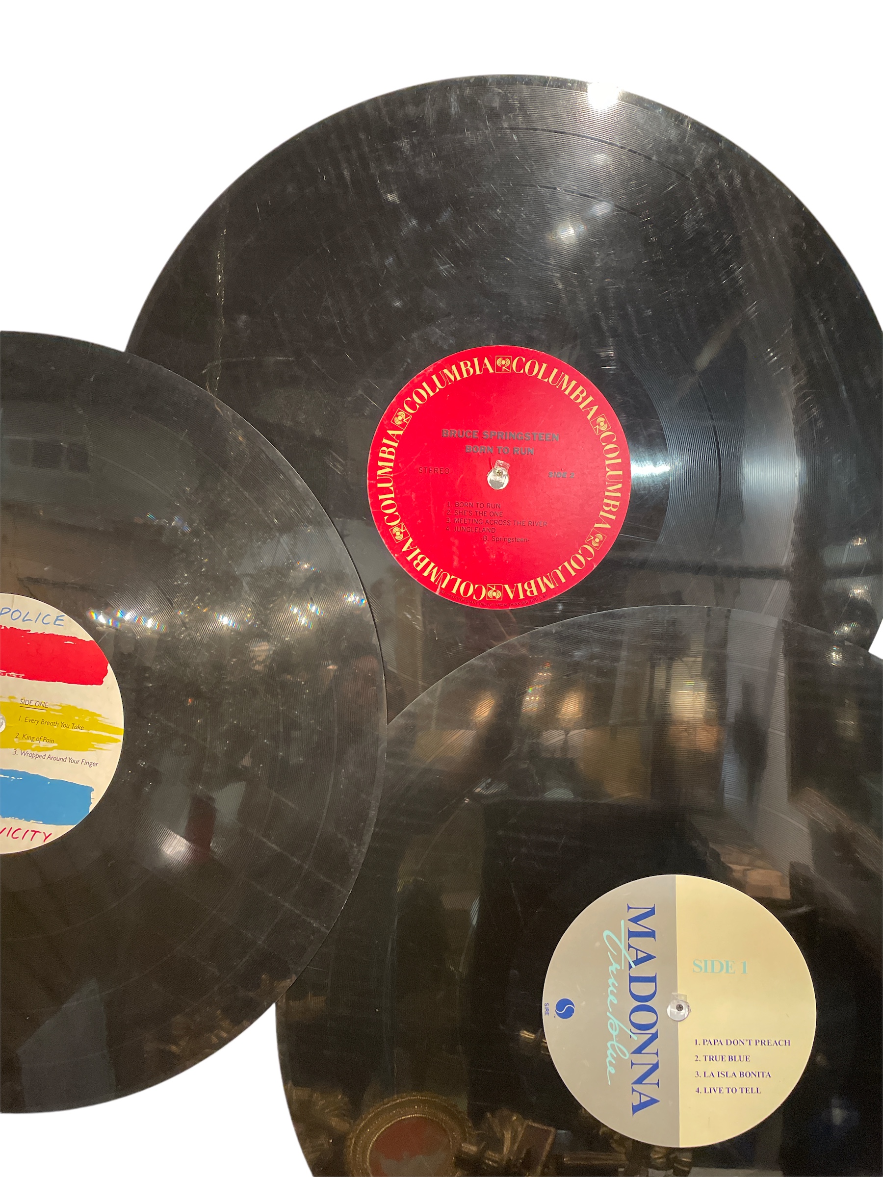 Three large display vinyl records